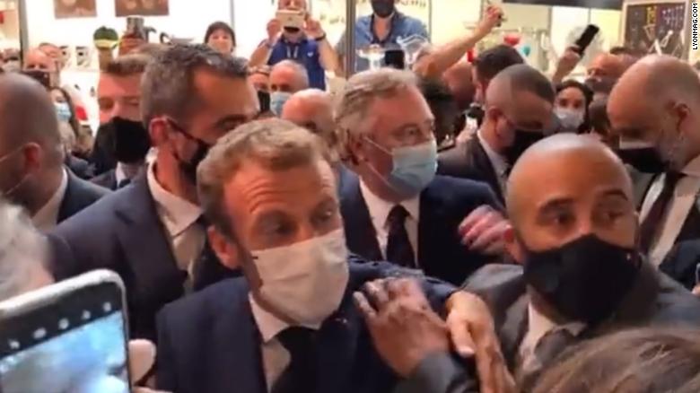 See moment Macron gets hit by egg thrown from crowd
