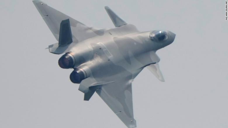 A J-20 stealth fighter jet of the Chinese People's Liberation Army (PLA) Air Force performs during the 13th China International Aviation and Aerospace Exhibition, also known as Airshow China 2021, on Tuesday, Sept. 28, 2021 in Zhuhai in southern China's Guangdong province.