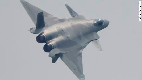 A J-20 stealth fighter jet of the Chinese People&#39;s Liberation Army (PLA) Air Force performs during the 13th China International Aviation and Aerospace Exhibition, also known as Airshow China 2021, on Tuesday, Sept. 28, 2021 in Zhuhai in southern China&#39;s Guangdong province. (AP Photo/Ng Han Guan)