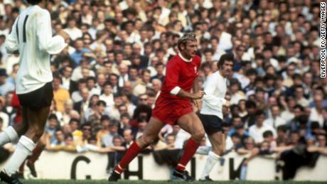 Roger Hunt of Liverpool runs with the ball as he is tracked by Roger Morgan (no.11) and John Pratt of Tottenham Hotspur during the English League Division One match between Tottenham Hotspur and Liverpool held at White Hart Lane, in London, England on Aug. 16, 1969. Liverpool won the match 2-0. 