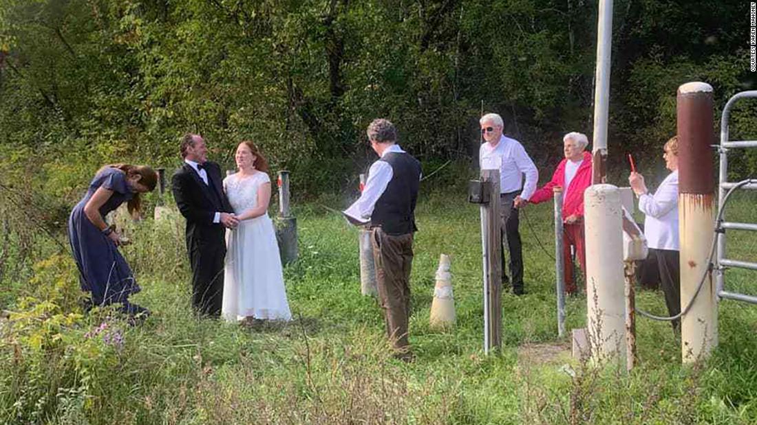 Covid-19 restrictions kept her family from attending her wedding, so she got married on the Canadian border