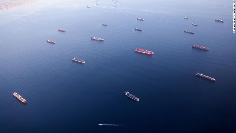 Container ships anchored by the ports of Long Beach and Los Angeles as they wait to offload on September 20, 2021.