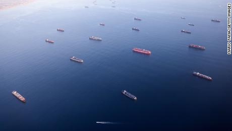 Container ships anchored by the ports of Long Beach and Los Angeles as they wait to offload on September 20, 2021.