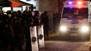 An ambulance leaves from the Litoral Penitentiary after a riot, in Guayaquil, Ecuador, Tuesday, Sept. 28, 2021. 