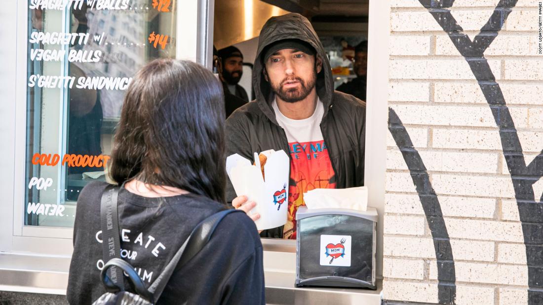 Eminem served pasta to guests at his restaurant opening