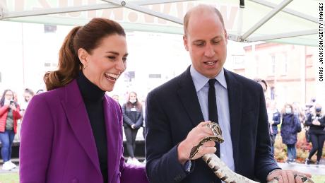 The Duke of Cambridge handles a snake during a tour of Ulster University&#39;s Magee Campus.