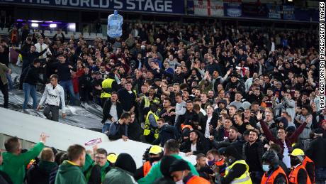 A water cooler is thrown amongst fans in the stands during the UEFA Europa League Group H match at the London Stadium, London.