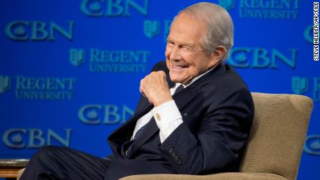 Pat Robertson will step down as host of the long-running Christian talk show, &quot;The 700 Club,&quot; he announced Friday. 