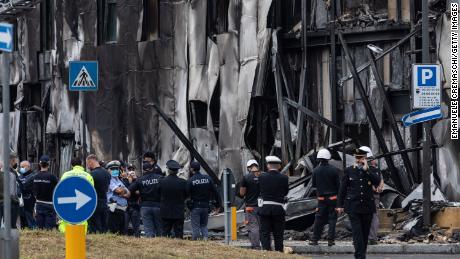 Small plane crashes into empty building outside Milan, all 8 onboard die