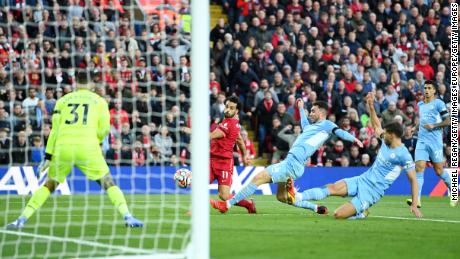 Mohamed Salah of Liverpool scores during a 2-2 draw with Manchester City in October 2021.