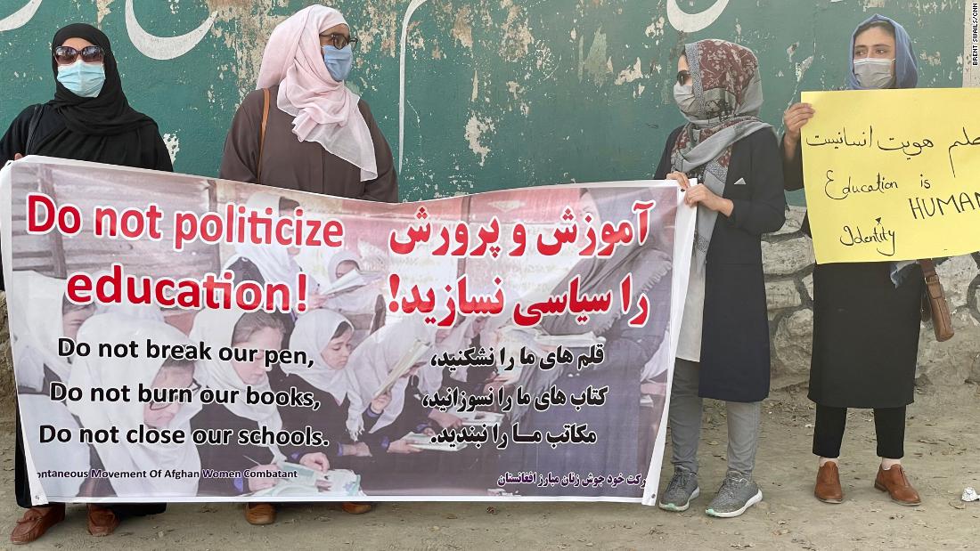 Women in Kabul return to work, school and the streets, in defiance of the Taliban