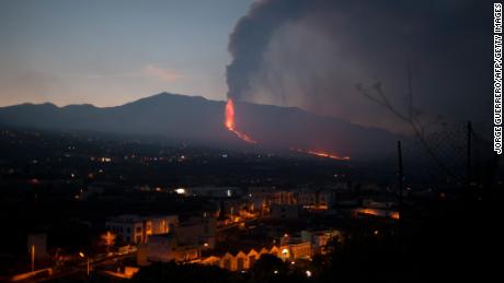 The Cumbre Vieja volcano spews lava, ash and smoke over Los Llanos de Aridane, on the Canary Island of La Palma, on Sunday.