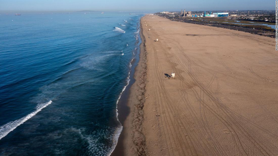 Waves bring oil ashore in Huntington Beach.