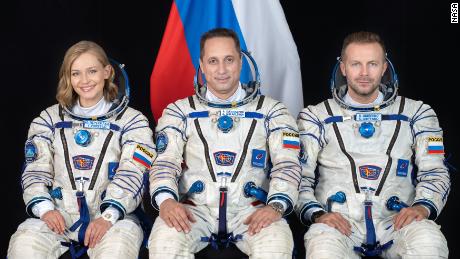 Russian crew film in space and return safely to Earth