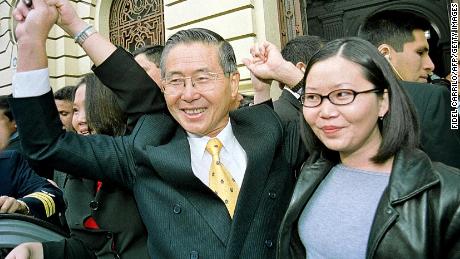 Fujimori greeting supporters in May 2000. 
