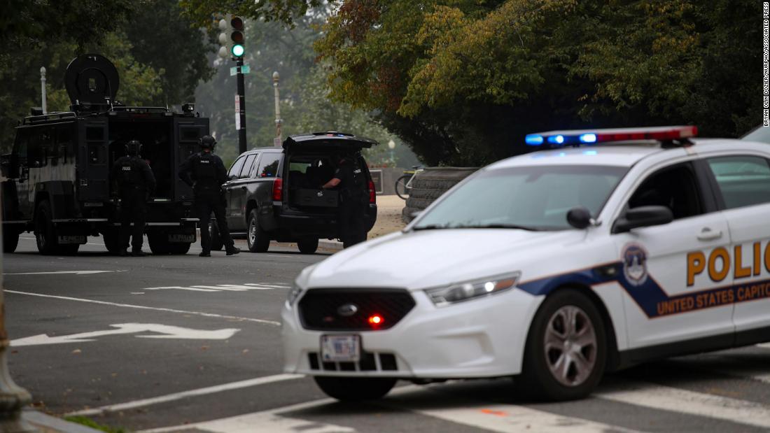 Capitol Police take a suspect into custody from a 'suspicious vehicle' in front of the Supreme Court