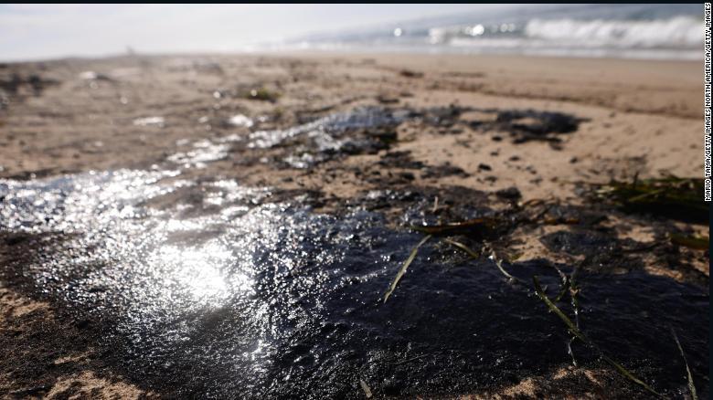 Oil is washed up on Huntington State Beach after a 126,000-gallon oil spill Friday.