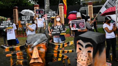 Protesters gather at the Commission of Human Rights in Quezon City, Metro Manila on October 6 following the presidential bid announcement of Ferdinand &quot;Bongbong&quot; Marcos Jr.