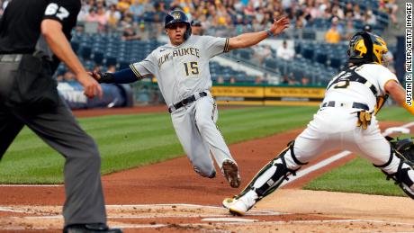 Tyrone Taylor of the Milwaukee Brewers scores  during a game at PNC Park in Pittsburgh on July 29, 2021.