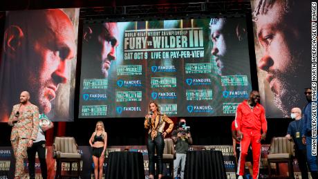 Broadcaster Kate Abdo moderates a news conference for WBC heavyweight champion Tyson Fury and Deontay Wilder at the MGM Grand Garden Arena on October 6, 2021 in Las Vegas, Nevada.