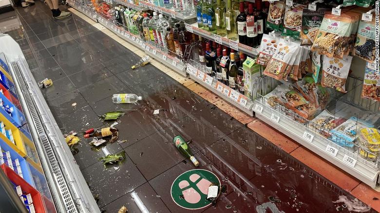 Items lay on the ground at a convenience store in Tokyo on October 7, 2021.
