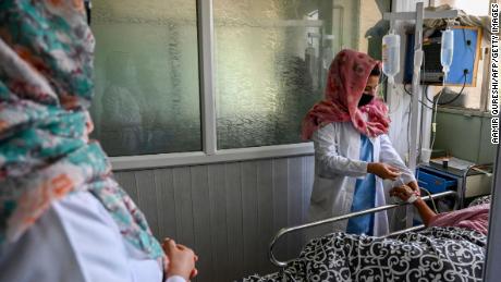 Female nurses takes care of patients at Wazir Akbar Khan hospital in Kabul on September 1, 2021.