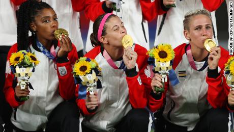 Labbe kisses her Olympic gold medal, Canada&#39;s first ever in women&#39;s soccer.