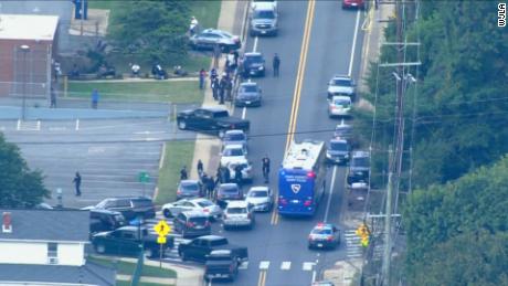 The scene outside a Maryland senior living facility where officials said two staff members were shot and killed Friday.