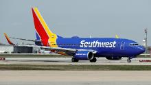 A Southwest Airlines Boeing 737-7H4 jet taxis to the gate after landing at Midway International Airport in Chicago, Illinois, on April 6, 2021. (Photo by KAMIL KRZACZYNSKI / AFP) (Photo by KAMIL KRZACZYNSKI/AFP via Getty Images)