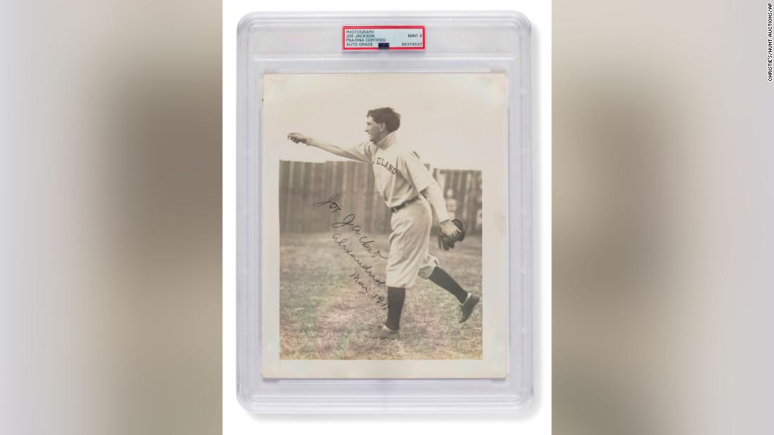 'Shoeless' Joe Jackson signed baseball photo sells for record price at auction