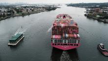 A cargo ship moves under the Bayonne Bridge as it heads out to the ocean on Oct. 6, 2021 in Bayonne, New Jersey. Global supply chain disruptions have continued to affect the U.S. economy. Despite continued uncertainly in the economy, stocks staged a comeback on Wednesday with markets rebounding as investors showed optimism about a possible debt ceiling deal.  