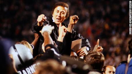 Head Coach Tom Flores of the Los Angeles Raiders is carried off the field by his players after they defeated the Washington Redskins 38-9 in Super Bowl XVIII  in 1984.
