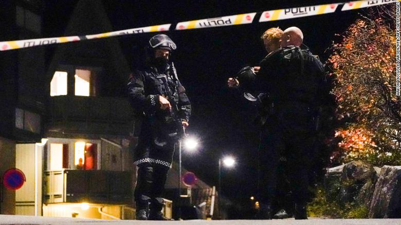 Police officers cordon off the scene in Kongsberg on October 13.