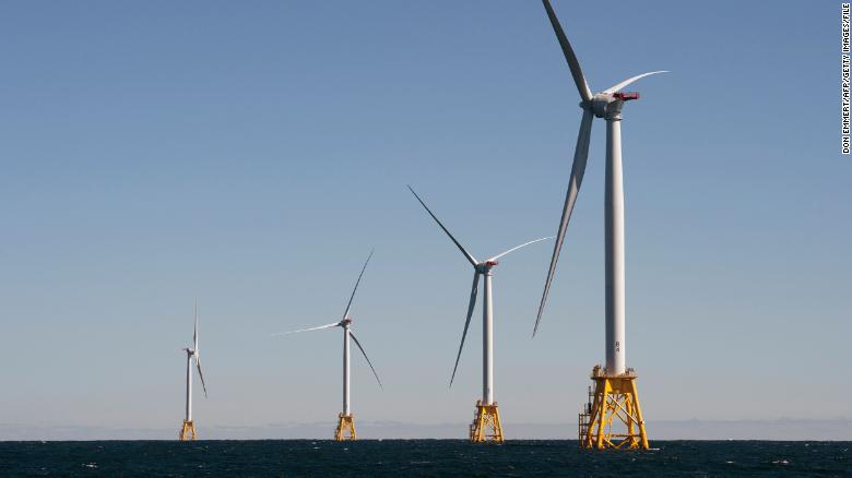 Wind turbines tower over the water off the shores of Block Island, Rhode Island. The Biden administration is planning a large expansion of wind power off US coasts.