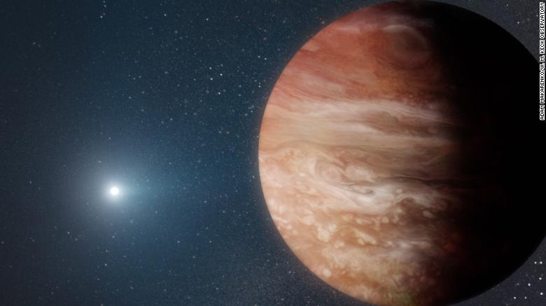 This illustration shows a Jupiter-like planet orbiting a dead white dwarf star.