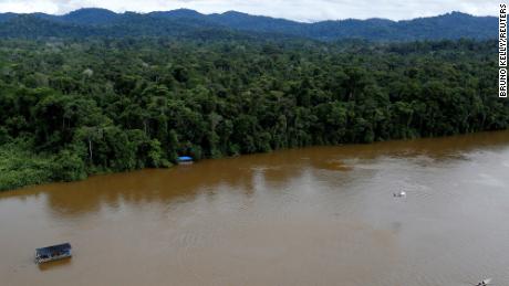 A gold dredge is seen at the banks of Uraricoera River in the heart of the Amazon rainforest, in Roraima state, Brazil April 15, 2016.