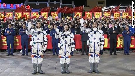 The three-member Shenzhou-13 crew at a departure ceremony on October 15 before their launch, at China&#39;s Jiuquan Satellite Launch Center.