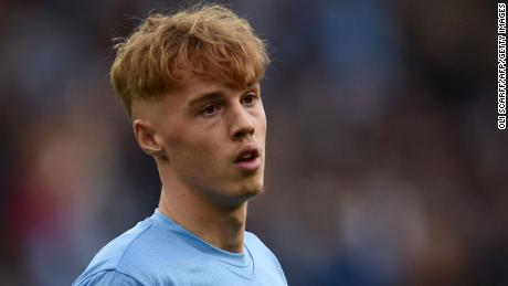 Cole Palmer plays during the Premier League match between Manchester City and Burnley.
