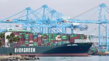 The Evergreen cargo ship &quot;Ever Liberal&quot; filled with containers is seen at the Port of Los Angeles on October 6, 2021 in San Pedro, California. - A record number of cargo ships have been stuck in limbo off the southern California coast waiting for entry to either the Ports of Los Angeles or Long Beach and Federal transportation investigators say premilinary findings suggest the recent oil spill off the southern California coast may have been caused by a ship&#39;s anchor hooking and tearing the pipeline that transports oil from platforms out at sea to the Port of Long Beach. (Photo by Frederic J. BROWN / AFP) (Photo by FREDERIC J. BROWN/AFP via Getty Images)