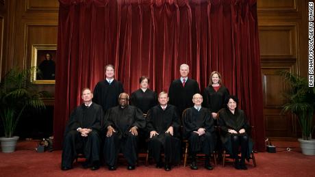 Members of the Supreme Court pose for a group photo in April. 