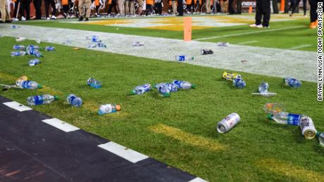 Debris is seen on the field after fans threw objects onto the field during the game between the Tennessee Volunteers and Mississippi Rebels at Neyland Stadium.