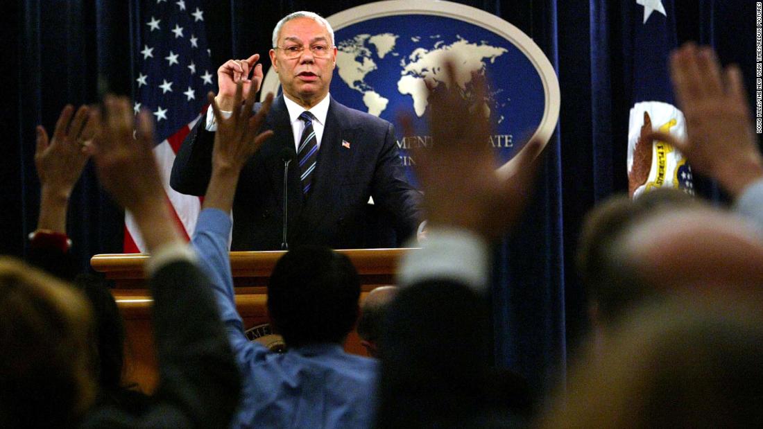 Powell takes reporters' questions during a 2004 news conference at the State Department.