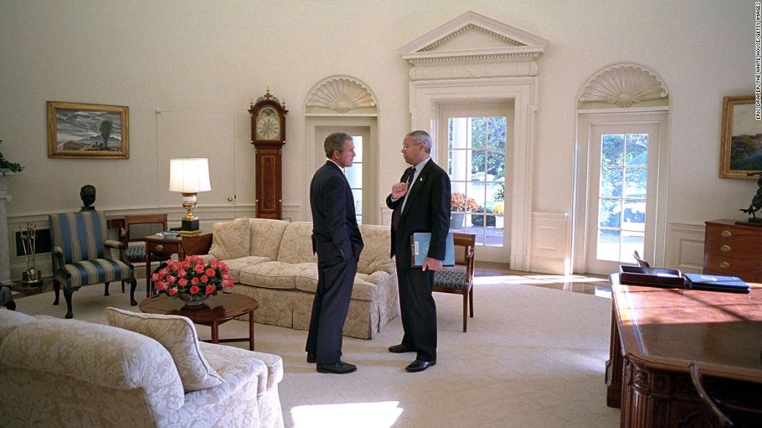 Bush and Powell meet in the White House Oval Office in 2001.