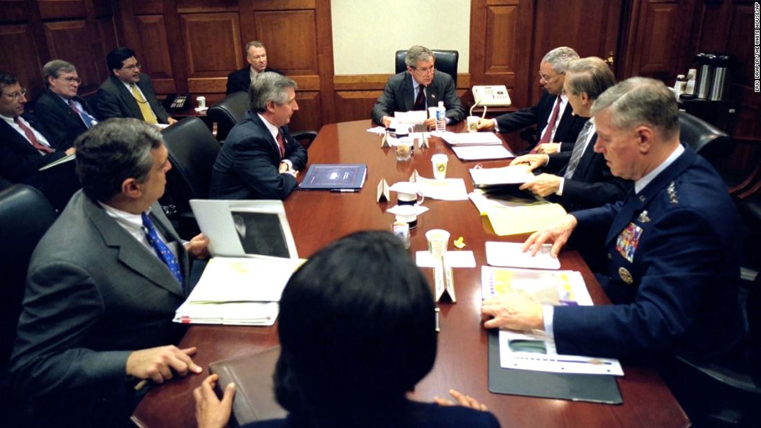 Bush meets with his war council in the White House Situation Room in 2003. Powell is next to Bush on the right.