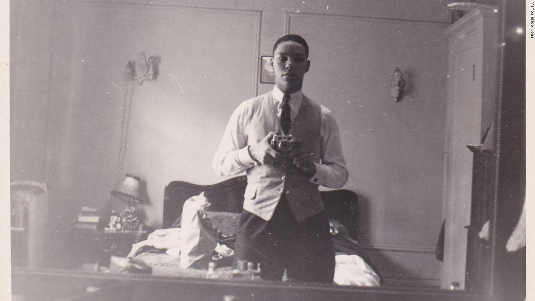 A young Powell takes a photo of himself in a mirror. Powell, a son of Jamaican immigrants, was born in Harlem, New York, in 1937 and grew up in the South Bronx. He attended the City College of New York, where he participated in ROTC, leading the precision drill team and attaining the top rank offered by the corps.