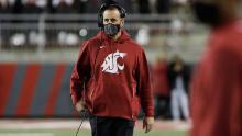 Washington State head coach Nick Rolovich walks along the sldeline during the second half of an NCAA college football game against Stanford, Saturday, Oct. 16, 2021, in Pullman, Wash.(AP Photo/Young Kwak)