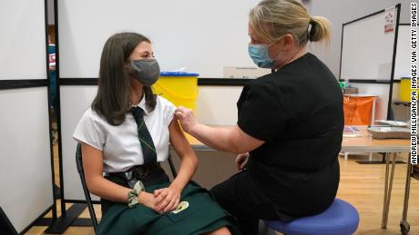Adolescents in England have to wait to be vaccinated at school, which has hampered the rollout.