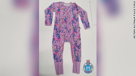 Cleo was last seen sleeping wearing a pink/purple one-piece sleep-suit with a blue and yellow pattern.