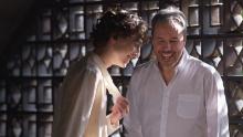 Chalamet and Villeneuve share a joke on set.