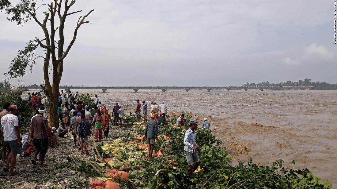 Floods and landslides kill at least 150 in India and Nepal